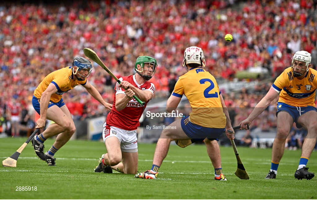 21 July 2024; Séamus Harnedy of Cork shoots wide under pressure from Clare players, from left, David McInerney, Adam Hogan and Conor Cleary during the GAA Hurling All-Ireland Senior Championship Final between Clare and Cork at Croke Park in Dublin. Photo by Sam Barnes/Sportsfile