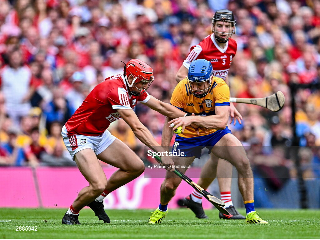 21 July 2024; Shane O'Donnell of Clare in action against Ciarán Joyce, left, and Eoin Downey of Cork during the GAA Hurling All-Ireland Senior Championship Final between Clare and Cork at Croke Park in Dublin. Photo by Piaras Ó Mídheach/Sportsfile