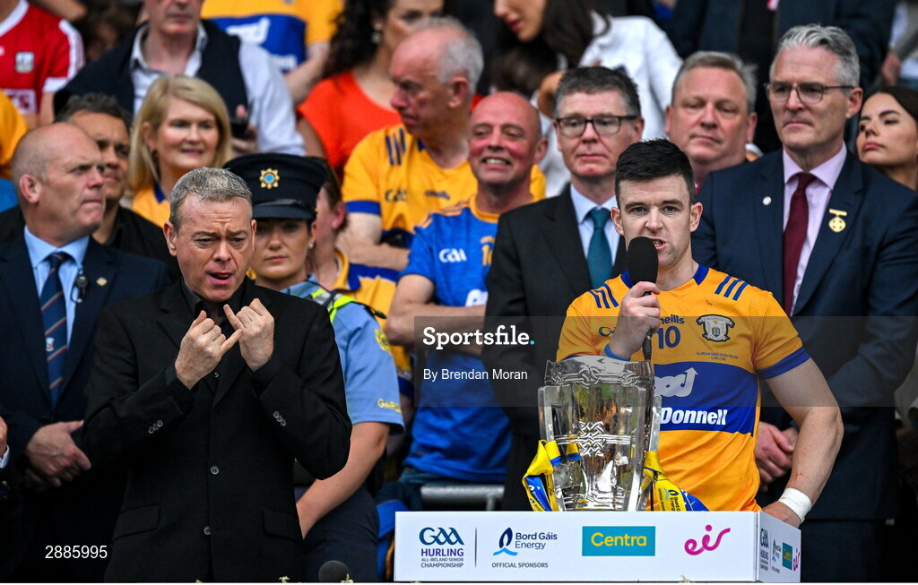 21 July 2024; Clare captain Tony Kelly makes his speech, which is signed by Senan Dunne, left, after the GAA Hurling All-Ireland Senior Championship Final between Clare and Cork at Croke Park in Dublin. Photo by Brendan Moran/Sportsfile