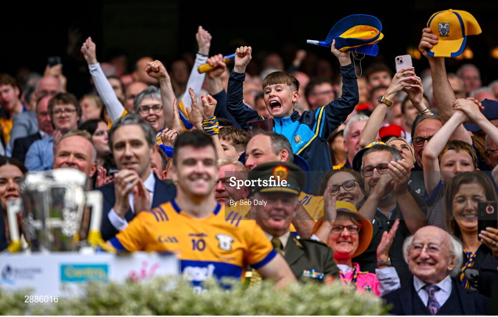 21 July 2024; A young Clare supporter celebrates before Clare captain Tony Kelly lifts the Liam MacCarthy Cup after their side's victory in during the GAA Hurling All-Ireland Senior Championship Final match between Clare and Cork at Croke Park in Dublin. Photo by Seb Daly/Sportsfile
