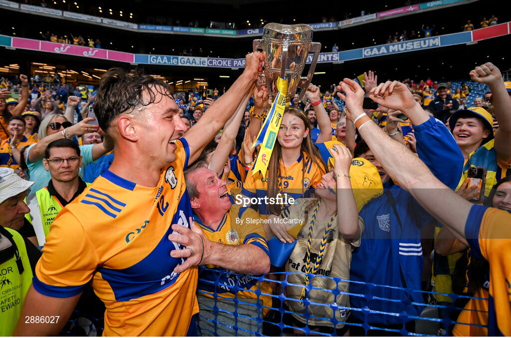 21 July 2024; Peter Duggan of Clare and supporters celebrate with the Liam MacCarthy cup after the GAA Hurling All-Ireland Senior Championship Final between Clare and Cork at Croke Park in Dublin. Photo by Stephen McCarthy/Sportsfile