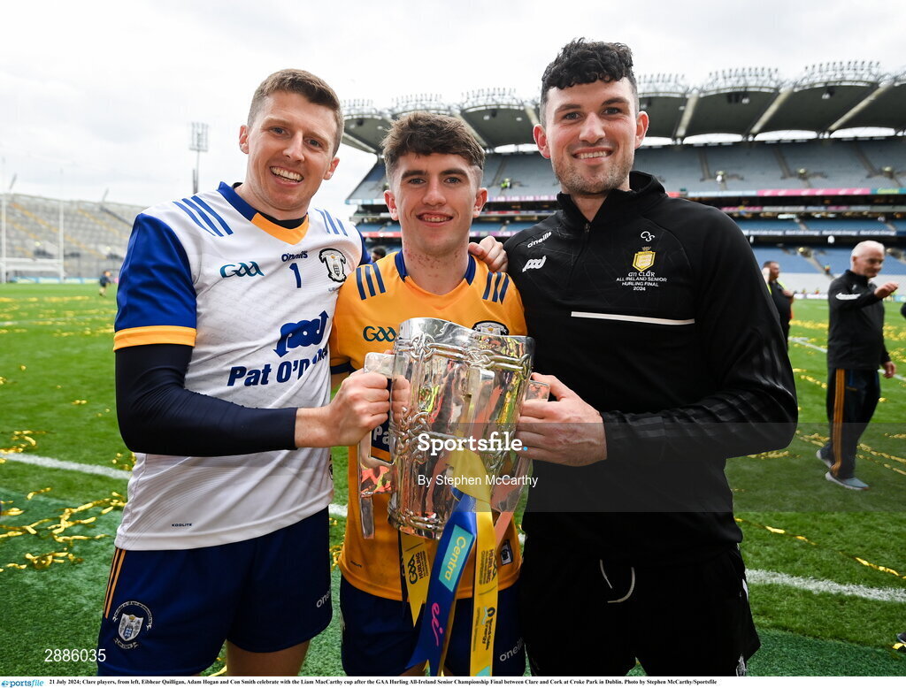21 July 2024; Clare players, from left, Eibhear Quilligan, Adam Hogan and Con Smith celebrate with the Liam MacCarthy cup after the GAA Hurling All-Ireland Senior Championship Final between Clare and Cork at Croke Park in Dublin. Photo by Stephen McCarthy/Sportsfile