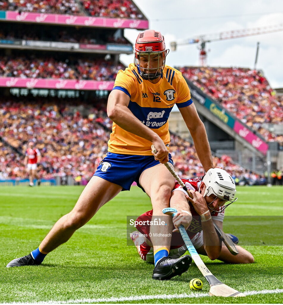 21 July 2024; Tim O'Mahony of Cork in action against Peter Duggan of Clare during the GAA Hurling All-Ireland Senior Championship Final between Clare and Cork at Croke Park in Dublin. Photo by Piaras Ó Mídheach/Sportsfile