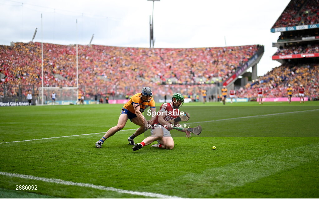 21 July 2024; Robbie O'Flynn of Cork in action against David McInerney of Clare during the GAA Hurling All-Ireland Senior Championship Final between Clare and Cork at Croke Park in Dublin. Photo by Stephen McCarthy/Sportsfile