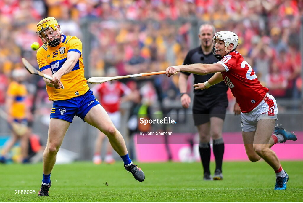 21 July 2024; Shane Meehan of Clare in action against Luke Meade of Cork during the GAA Hurling All-Ireland Senior Championship Final between Clare and Cork at Croke Park in Dublin. Photo by John Sheridan/Sportsfile
