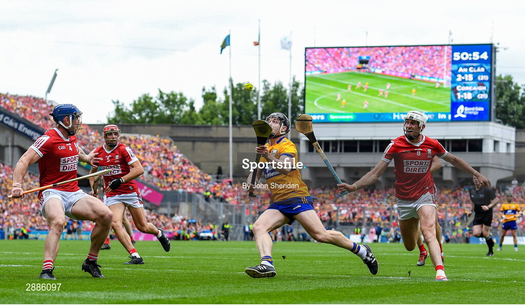 21 July 2024; Tony Kelly of Clare in action against Cork players, from right, Tim O'Mahony, Ciarán Joyce and Seán O'Donoghue during the GAA Hurling All-Ireland Senior Championship Final between Clare and Cork at Croke Park in Dublin. Photo by John Sheridan/Sportsfile