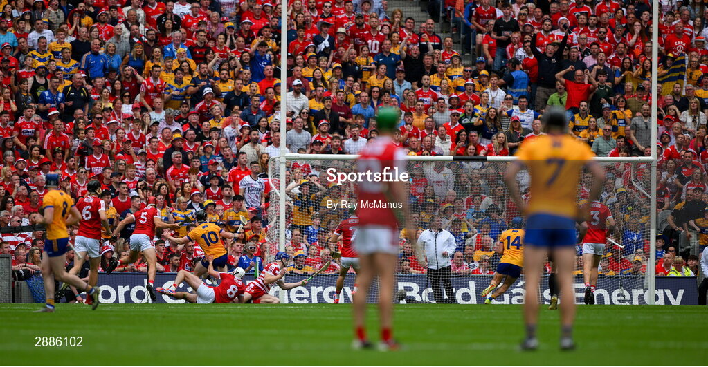 21 July 2024; Clare captain Tony Kelly, 10, shoots past Cork goalkeeper Patrick Collins to score his sides 3rd goal during the GAA Hurling All-Ireland Senior Championship Final between Clare and Cork at Croke Park in Dublin. Photo by Ray McManus/Sportsfile