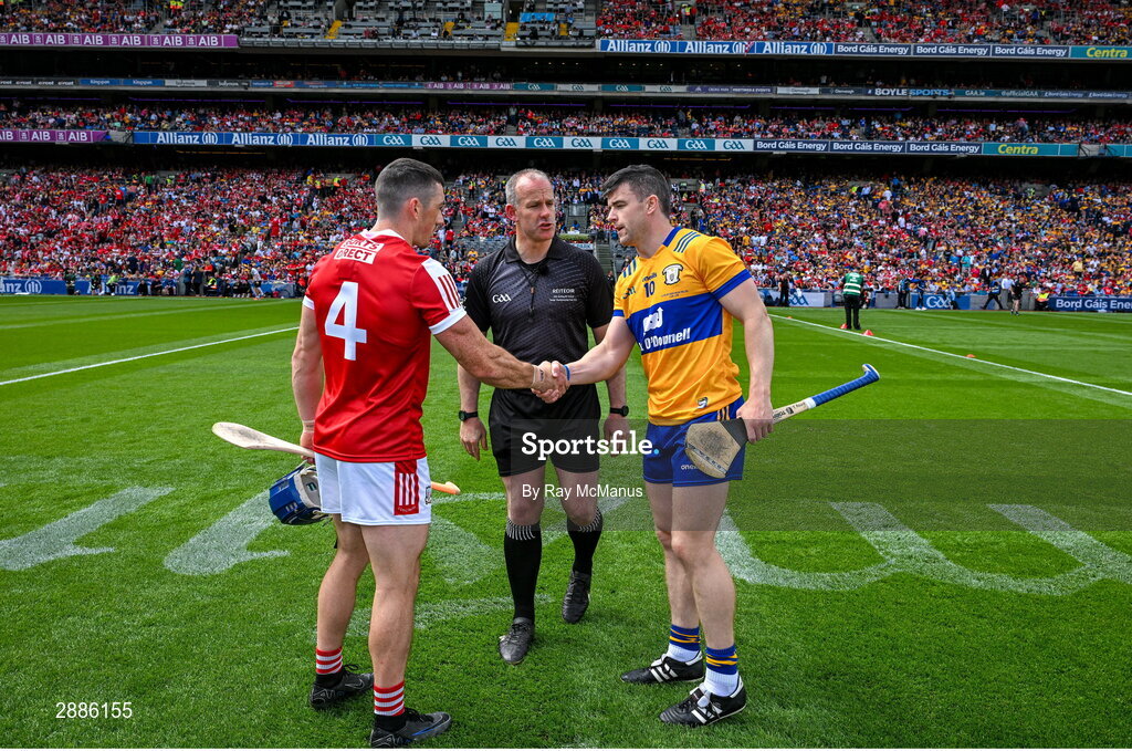21 July 2024; Referee Johnny Murphy with the two captains, Sean O'Donoghue of Cork and Tony Kelly of Clare before the GAA Hurling All-Ireland Senior Championship Final between Clare and Cork at Croke Park in Dublin. Photo by Ray McManus/Sportsfile