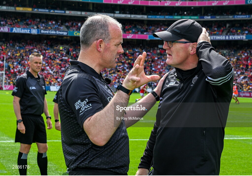 21 July 2024; Referee Johnny Murphy in conversation with Clare manager Brian Lohan before the GAA Hurling All-Ireland Senior Championship Final between Clare and Cork at Croke Park in Dublin. Photo by Ray McManus/Sportsfile