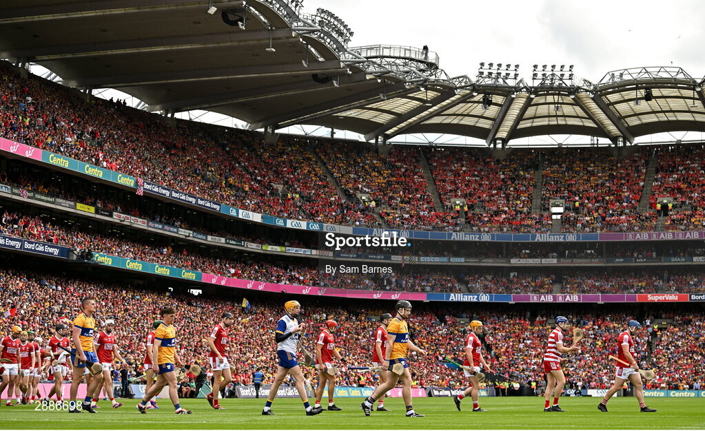 21 July 2024; Players from both sides march behind the Artane band before the GAA Hurling All-Ireland Senior Championship Final between Clare and Cork at Croke Park in Dublin. Photo by Sam Barnes/Sportsfile