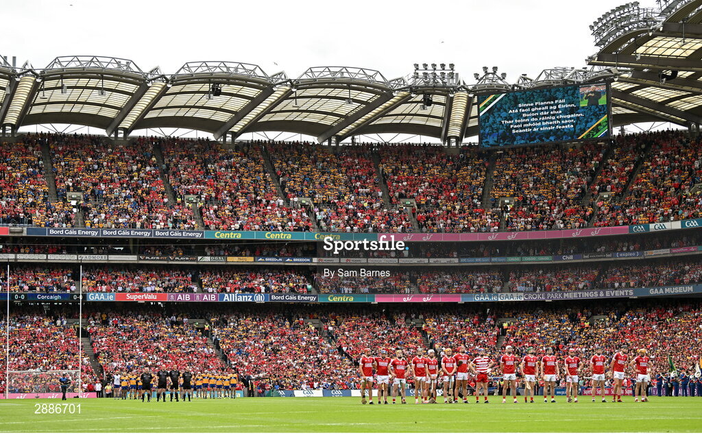 21 July 2024; Players and officials stand for Amhrán na bhFiann before the GAA Hurling All-Ireland Senior Championship Final between Clare and Cork at Croke Park in Dublin. Photo by Sam Barnes/Sportsfile
