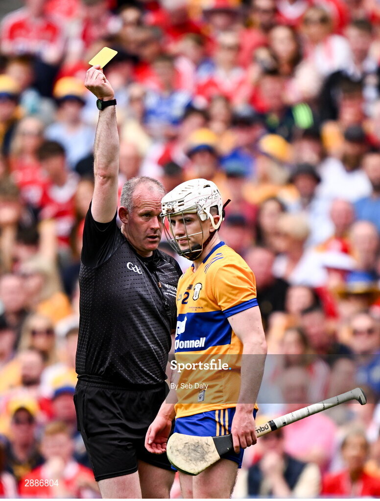 21 July 2024; Referee Johnny Murphy shows a yellow card to Adam Hogan of Clare during the GAA Hurling All-Ireland Senior Championship Final match between Clare and Cork at Croke Park in Dublin. Photo by Seb Daly/Sportsfile