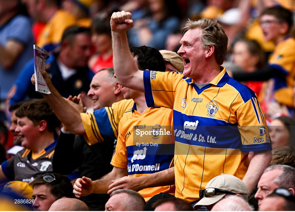 21 July 2024; Clare supporters celebrate during the GAA Hurling All-Ireland Senior Championship Final match between Clare and Cork at Croke Park in Dublin. Photo by Seb Daly/Sportsfile