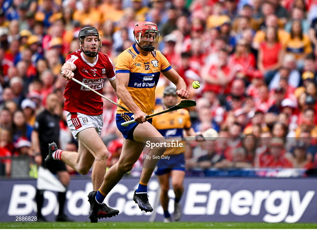 21 July 2024; Peter Duggan of Clare in action against Eoin Downey of Cork during the GAA Hurling All-Ireland Senior Championship Final match between Clare and Cork at Croke Park in Dublin. Photo by Seb Daly/Sportsfile