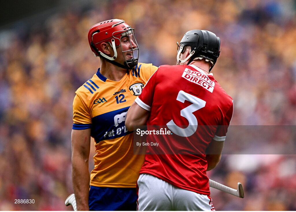 21 July 2024; Peter Duggan of Clare tussles with Eoin Downey of Cork during the GAA Hurling All-Ireland Senior Championship Final match between Clare and Cork at Croke Park in Dublin. Photo by Seb Daly/Sportsfile