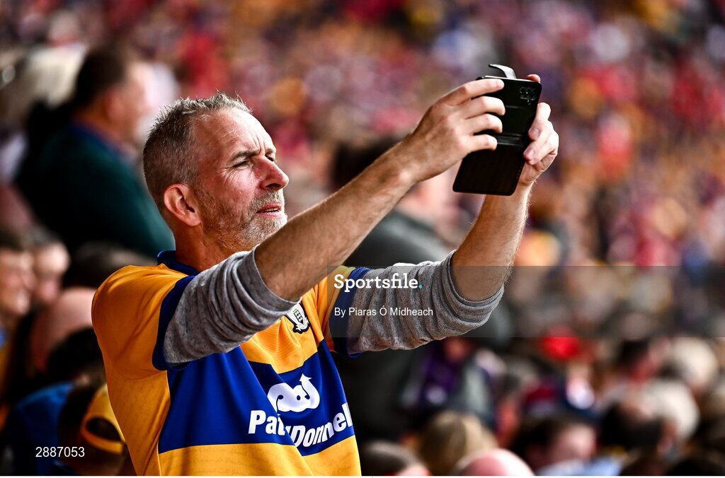 21 July 2024; A Clare supporter takes a picture before the GAA Hurling All-Ireland Senior Championship Final between Clare and Cork at Croke Park in Dublin. Photo by Piaras Ó Mídheach/Sportsfile