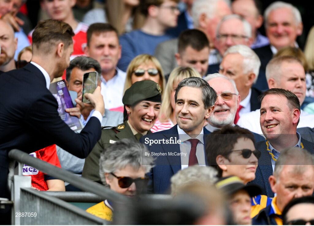 21 July 2024; An Taoiseach Simon Harris TD poses for a photograph with Joe Carey TD before the GAA Hurling All-Ireland Senior Championship Final between Clare and Cork at Croke Park in Dublin. Photo by Stephen McCarthy/Sportsfile