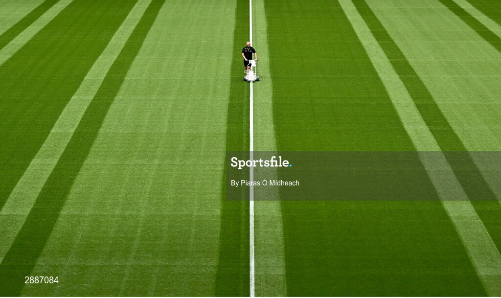 21 July 2024; Groundsman Darren Jepson painting lines on the pitch before the GAA Hurling All-Ireland Senior Championship Final between Clare and Cork at Croke Park in Dublin. Photo by Piaras Ó Mídheach/Sportsfile