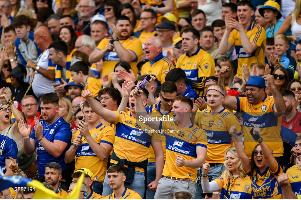 21 July 2024; Clare supporters celebrate a score during the GAA Hurling All-Ireland Senior Championship Final between Clare and Cork at Croke Park in Dublin. Photo by Stephen McCarthy/Sportsfile