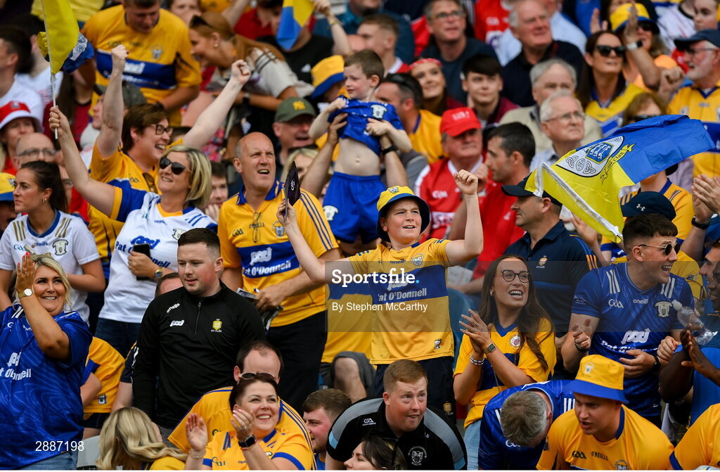 21 July 2024; Clare supporters celebrate a score during the GAA Hurling All-Ireland Senior Championship Final between Clare and Cork at Croke Park in Dublin. Photo by Stephen McCarthy/Sportsfile