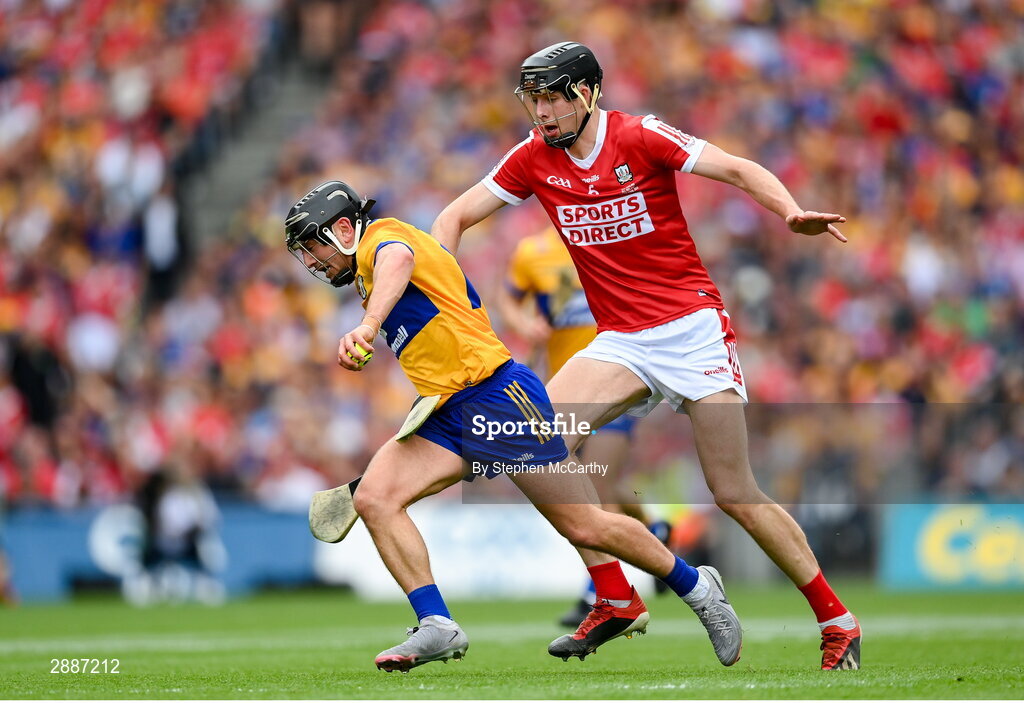 21 July 2024; David Reidy of Clare in action against Robert Downey of Cork during the GAA Hurling All-Ireland Senior Championship Final between Clare and Cork at Croke Park in Dublin. Photo by Stephen McCarthy/Sportsfile