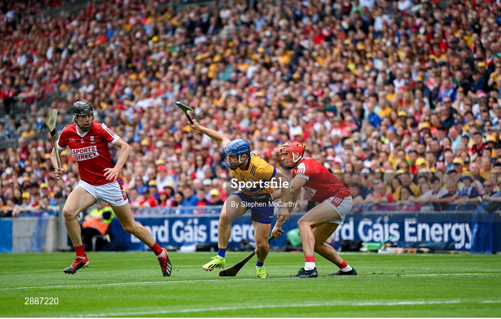 21 July 2024; Shane O'Donnell of Clare is tackled by Ciarán Joyce of Cork during the GAA Hurling All-Ireland Senior Championship Final between Clare and Cork at Croke Park in Dublin. Photo by Stephen McCarthy/Sportsfile