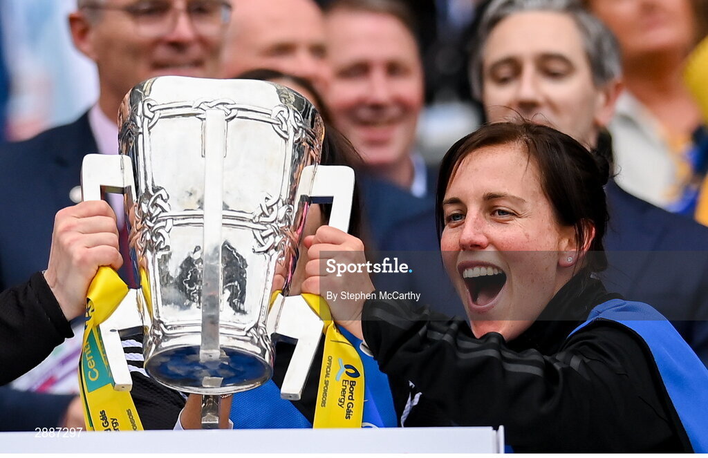 21 July 2024; Clare physiotherapist Kathryn Fahy lifts the Liam MacCarthy cup after the GAA Hurling All-Ireland Senior Championship Final between Clare and Cork at Croke Park in Dublin. Photo by Stephen McCarthy/Sportsfile