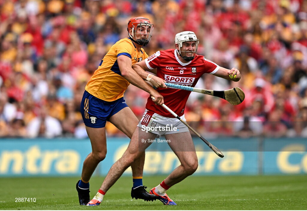 21 July 2024; Tim O'Mahony of Cork in action against Peter Duggan of Clare during the GAA Hurling All-Ireland Senior Championship Final between Clare and Cork at Croke Park in Dublin. Photo by Sam Barnes/Sportsfile