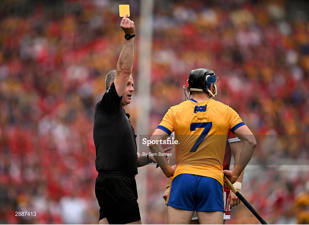 21 July 2024; Referee Johnny Murphy shows the yellow card to Alan Connolly of Cork and David McInerney of Clare during the GAA Hurling All-Ireland Senior Championship Final between Clare and Cork at Croke Park in Dublin. Photo by Sam Barnes/Sportsfile