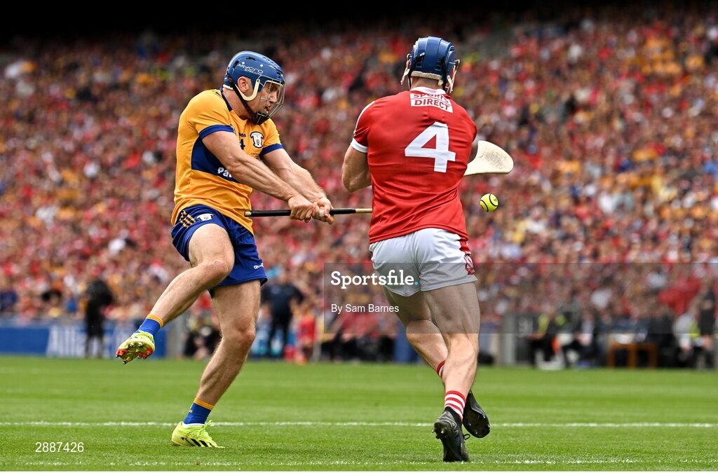 21 July 2024; Shane O'Donnell of Clare has a shot on goal under pressure from Seán O'Donoghue of Cork during the GAA Hurling All-Ireland Senior Championship Final between Clare and Cork at Croke Park in Dublin. Photo by Sam Barnes/Sportsfile