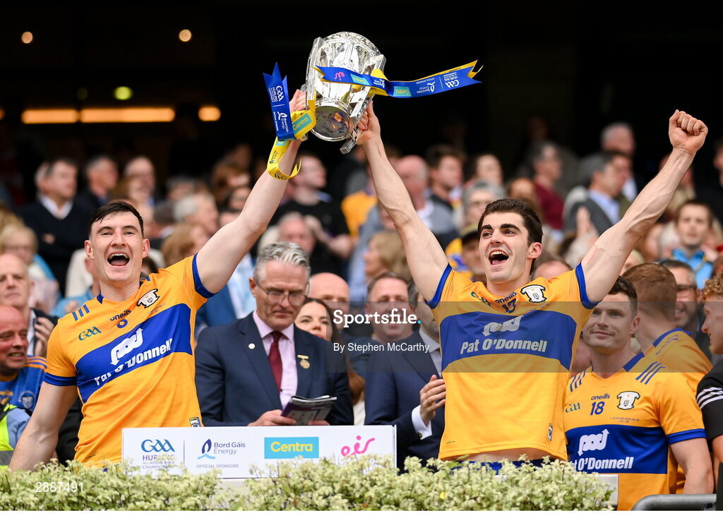 21 July 2024; David Fitzgerald, left, and Aidan McCarthy of Clare lift the Liam MacCarthy cup following victory in the GAA Hurling All-Ireland Senior Championship Final between Clare and Cork at Croke Park in Dublin. Photo by Stephen McCarthy/Sportsfile