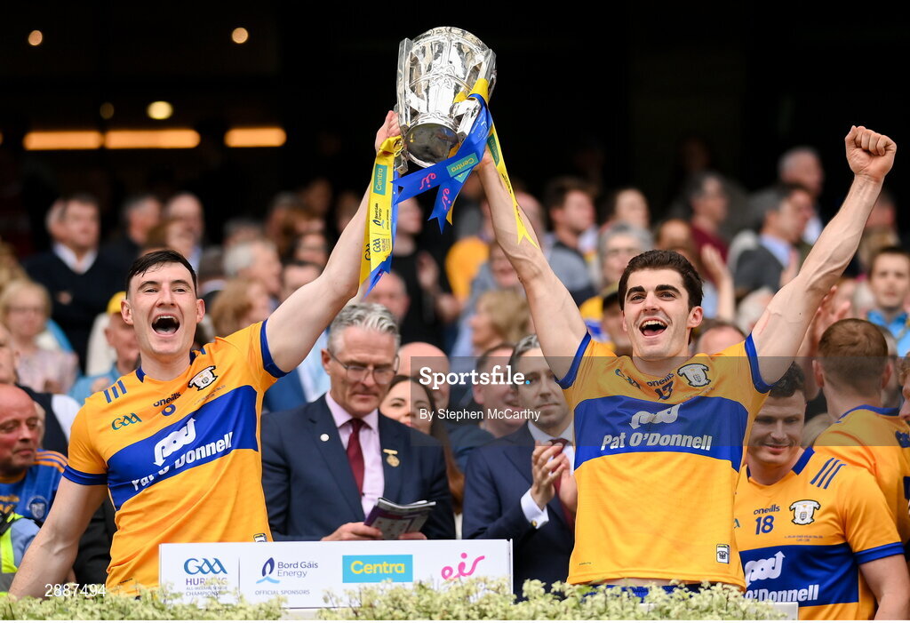 21 July 2024; David Fitzgerald, left, and Aidan McCarthy of Clare lift the Liam MacCarthy cup following victory in the GAA Hurling All-Ireland Senior Championship Final between Clare and Cork at Croke Park in Dublin. Photo by Stephen McCarthy/Sportsfile