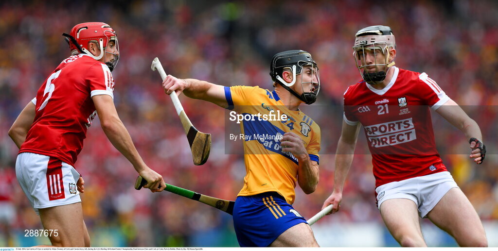 21 July 2024; Ian Galvin of Clare is tackled by Ethan Twomey of Cork and Ciarán Joyce, left, during the GAA Hurling All-Ireland Senior Championship Final between Clare and Cork at Croke Park in Dublin. Photo by Ray McManus/Sportsfile