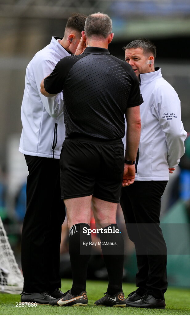 21 July 2024; Referee Johnny Murphy consults with his umpires during the GAA Hurling All-Ireland Senior Championship Final between Clare and Cork at Croke Park in Dublin. Photo by Ray McManus/Sportsfile