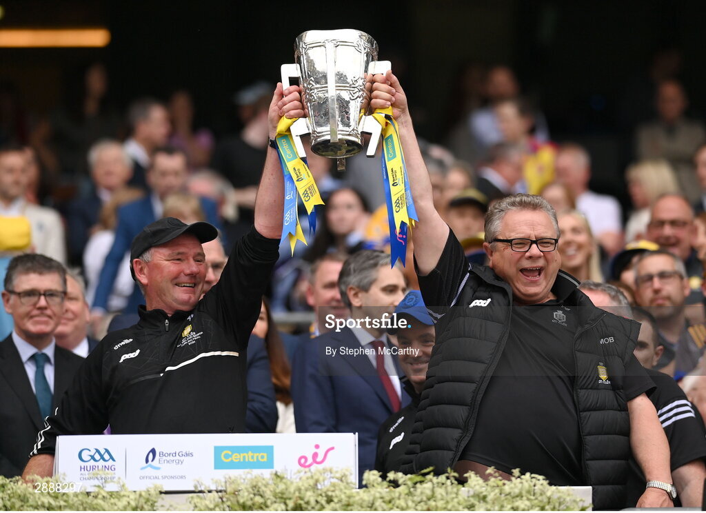 21 July 2024; Martin O'Brien, left, and Kieran O'Neill  lift the Liam MacCarthy cup following victory in the GAA Hurling All-Ireland Senior Championship Final between Clare and Cork at Croke Park in Dublin. Photo by Stephen McCarthy/Sportsfile