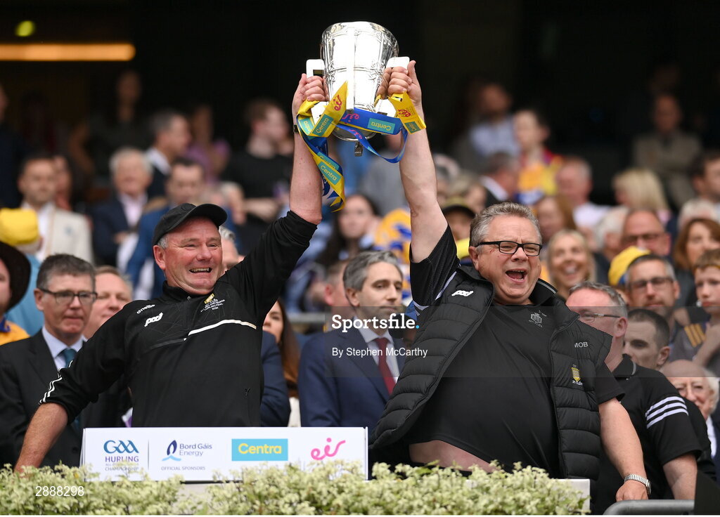 21 July 2024; Martin O'Brien, left, and Kieran O'Neill  lift the Liam MacCarthy cup following victory in the GAA Hurling All-Ireland Senior Championship Final between Clare and Cork at Croke Park in Dublin. Photo by Stephen McCarthy/Sportsfile