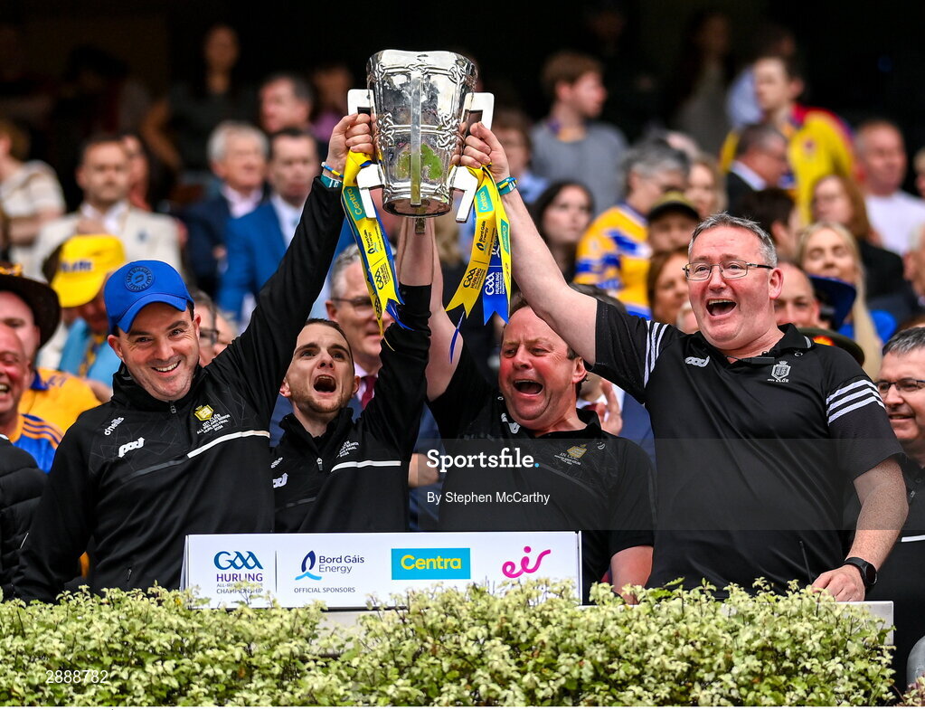 21 July 2024; Éamonn Meyers, Shane Lorigan, Liam and Donnacha Corrigan lift the Liam MacCarthy cup following victory in the GAA Hurling All-Ireland Senior Championship Final between Clare and Cork at Croke Park in Dublin. Photo by Stephen McCarthy/Sportsfile