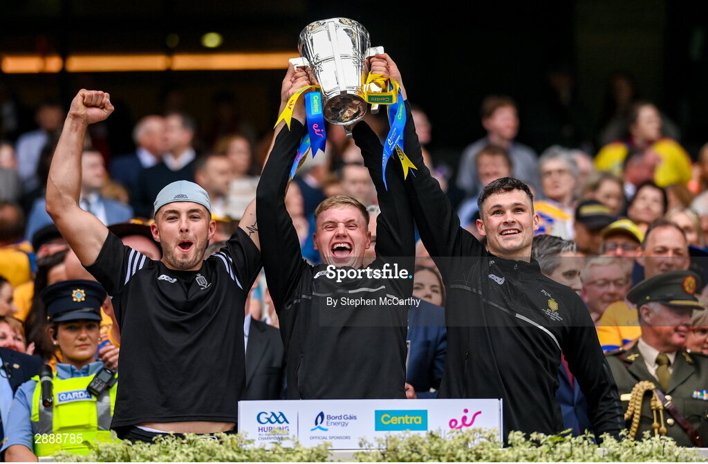 21 July 2024; Clare players, from left, Dylan McMahon, Colm O'Meara and Padraic O'Loughlin lift the Liam MacCarthy cup following victory in the GAA Hurling All-Ireland Senior Championship Final between Clare and Cork at Croke Park in Dublin. Photo by Stephen McCarthy/Sportsfile