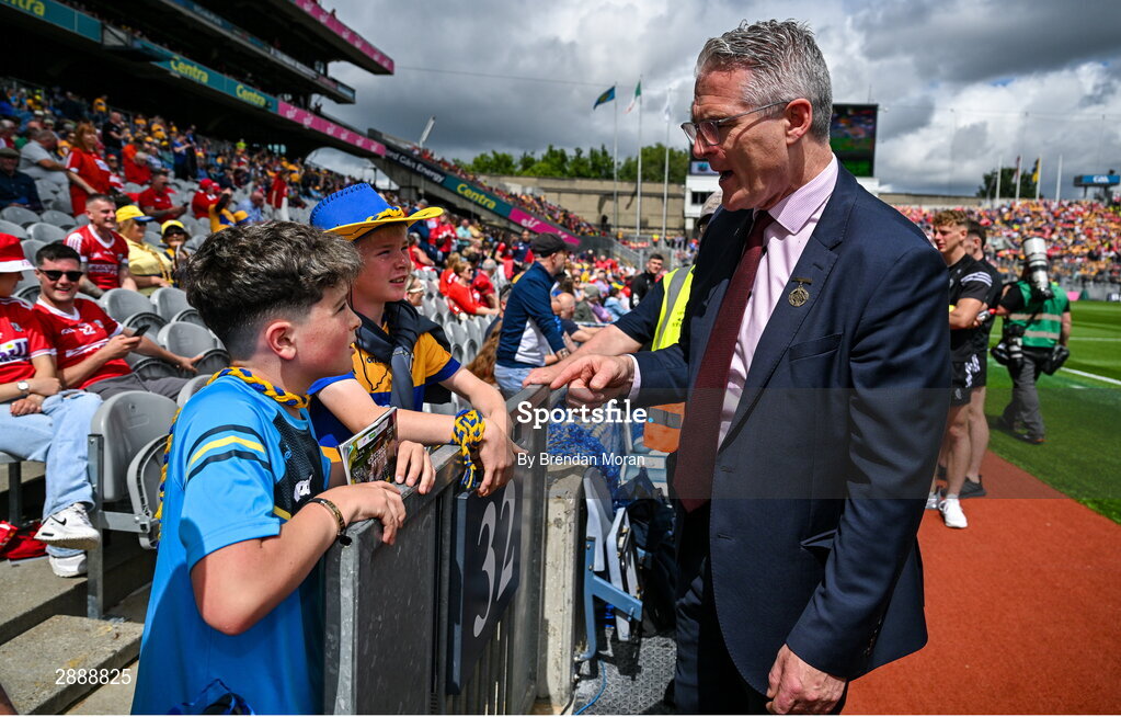 21 July 2024; Uachtarán Chumann Lúthchleas Gael Jarlath Burns meets young Clare supporters before the GAA Hurling All-Ireland Senior Championship Final between Clare and Cork at Croke Park in Dublin. Photo by Brendan Moran/Sportsfile