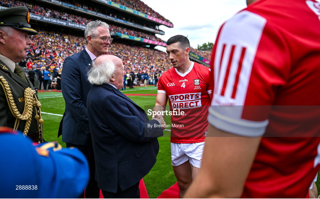 21 July 2024; President of Ireland Michael D Higgins, in the company of Uachtarán Chumann Lúthchleas Gael Jarlath Burns meets Cork captain Seán O'Donoghue before the GAA Hurling All-Ireland Senior Championship Final between Clare and Cork at Croke Park in Dublin. Photo by Brendan Moran/Sportsfile
