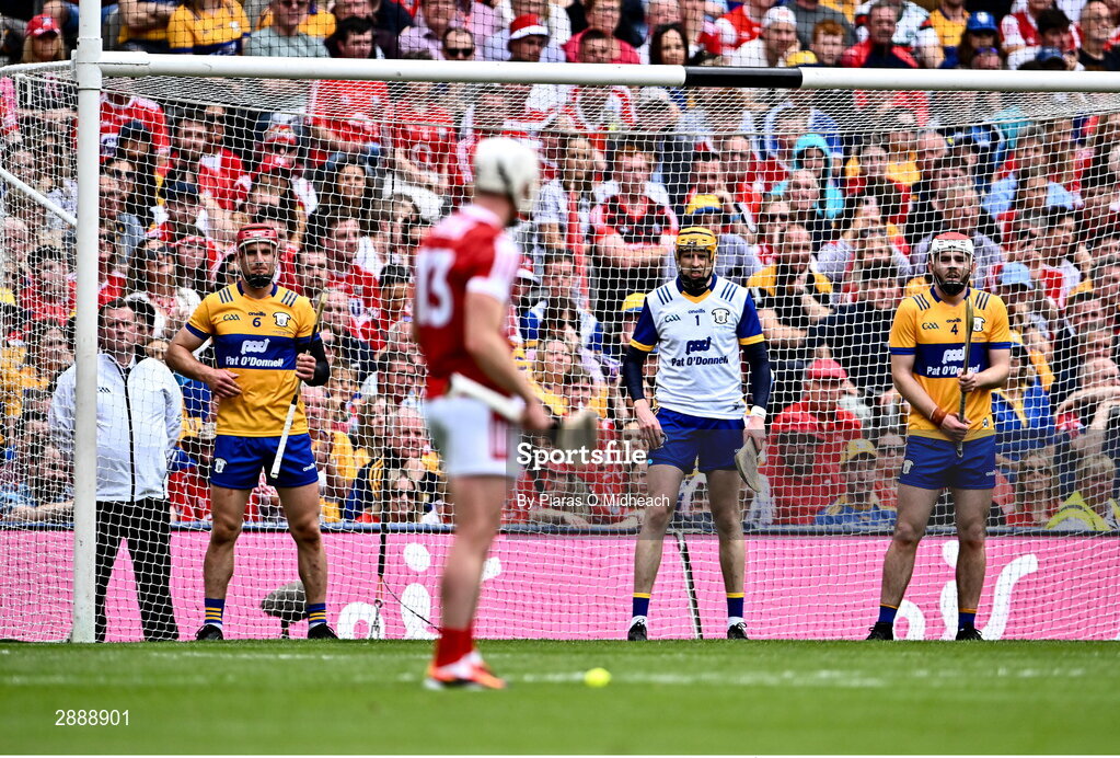 21 July 2024; Clare players, from left, John Conlon, goalkeeper Eibhear Quilligan and Conor Leen await a free from Patrick Horgan of Cork during the GAA Hurling All-Ireland Senior Championship Final between Clare and Cork at Croke Park in Dublin. Photo by Piaras Ó Mídheach/Sportsfile