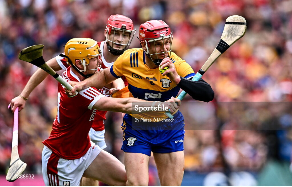 21 July 2024; John Conlon of Clare in action against Shane Barrett of Cork during the GAA Hurling All-Ireland Senior Championship Final between Clare and Cork at Croke Park in Dublin. Photo by Piaras Ó Mídheach/Sportsfile