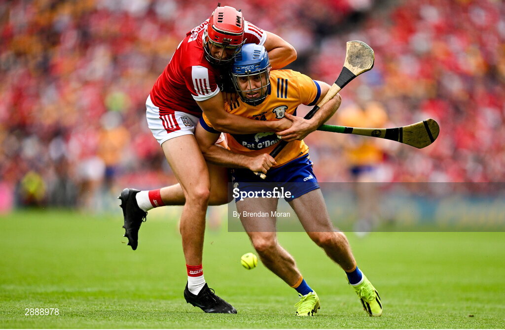 21 July 2024; Shane O'Donnell of Clare is tackled by Seán O'Donoghue of Cork during the GAA Hurling All-Ireland Senior Championship Final between Clare and Cork at Croke Park in Dublin. Photo by Brendan Moran/Sportsfile