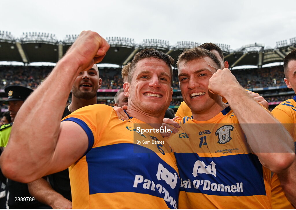 21 July 2024; Shane O'Donnell of Clare, right, celebrates with team-mate John Conlon after their side's victory in the GAA Hurling All-Ireland Senior Championship Final between Clare and Cork at Croke Park in Dublin. Photo by Sam Barnes/Sportsfile
