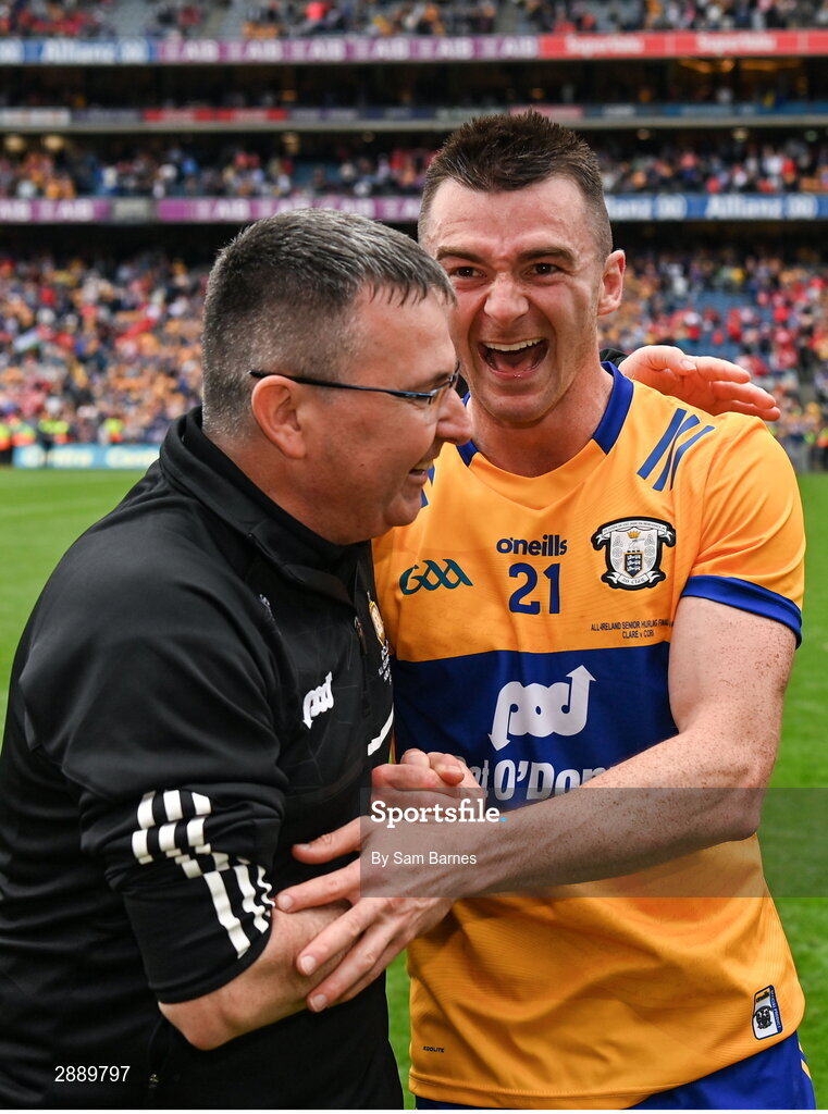 21 July 2024; Ryan Taylor of Clare celebrates with a member of the backroom team after their side's victory in the GAA Hurling All-Ireland Senior Championship Final between Clare and Cork at Croke Park in Dublin. Photo by Sam Barnes/Sportsfile
