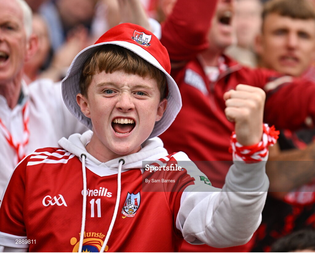 21 July 2024; A Cork supporter celebrates a score during the GAA Hurling All-Ireland Senior Championship Final between Clare and Cork at Croke Park in Dublin. Photo by Sam Barnes/Sportsfile