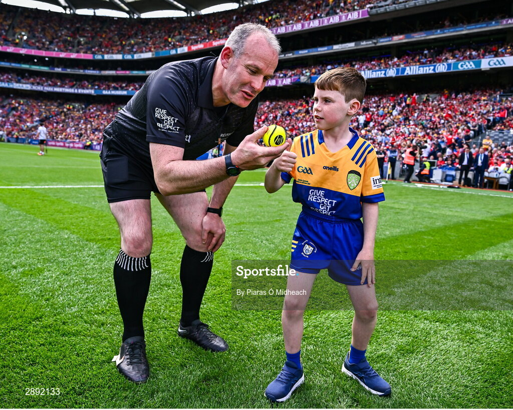 21 July 2024; Conor Moroney from Kilmaley in Clare on the pitch to present referee Johnny Murphy with the official match sliotar before the GAA Hurling All-Ireland Senior Championship Final between Clare and Cork at Croke Park in Dublin. Photo by Piaras Ó Mídheach/Sportsfile