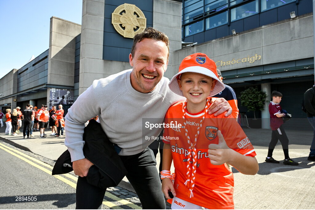28 July 2024; Former Mayo footballer Andy Moran with Armagh supporter Tomás Og McNicholl, ten years, from the Moy Club, before GAA Football All-Ireland Senior Championship Final match between Armagh and Galway at Croke Park in Dublin. Photo by Ray McManus/Sportsfile