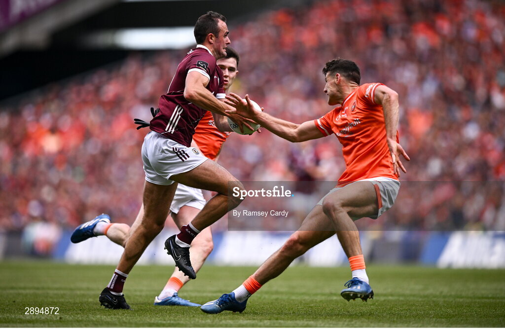 28 July 2024; John Maher of Galway in action against Ben Crealey and Niall Grimley of Armagh during the GAA Football All-Ireland Senior Championship Final match between Armagh and Galway at Croke Park in Dublin. Photo by Ramsey Cardy/Sportsfile