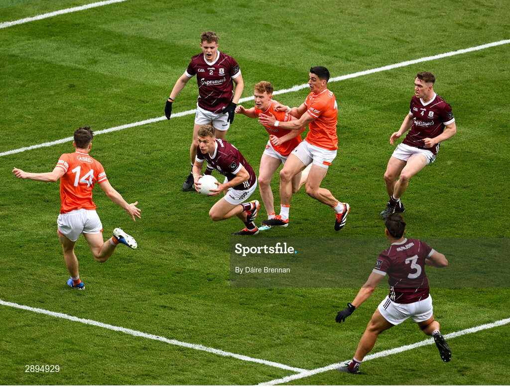 28 July 2024; Dylan McHugh of Galway breaks away from the Armagh full-forward line, left to right, Andrew Murnin, Conor Turbitt, and Rory Grugan during the GAA Football All-Ireland Senior Championship Final match between Armagh and Galway at Croke Park in Dublin. Photo by Daire Brennan/Sportsfile